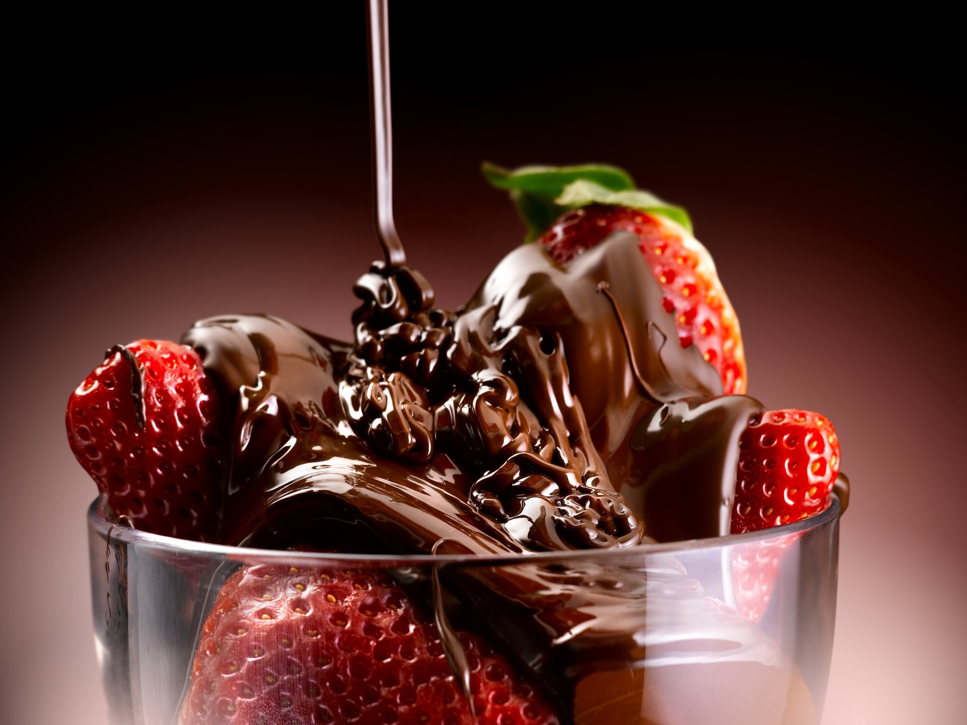 sweet dessert strawberries in chocolate trickle of chocolate chocolate-covered strawberries a stream of chocolate