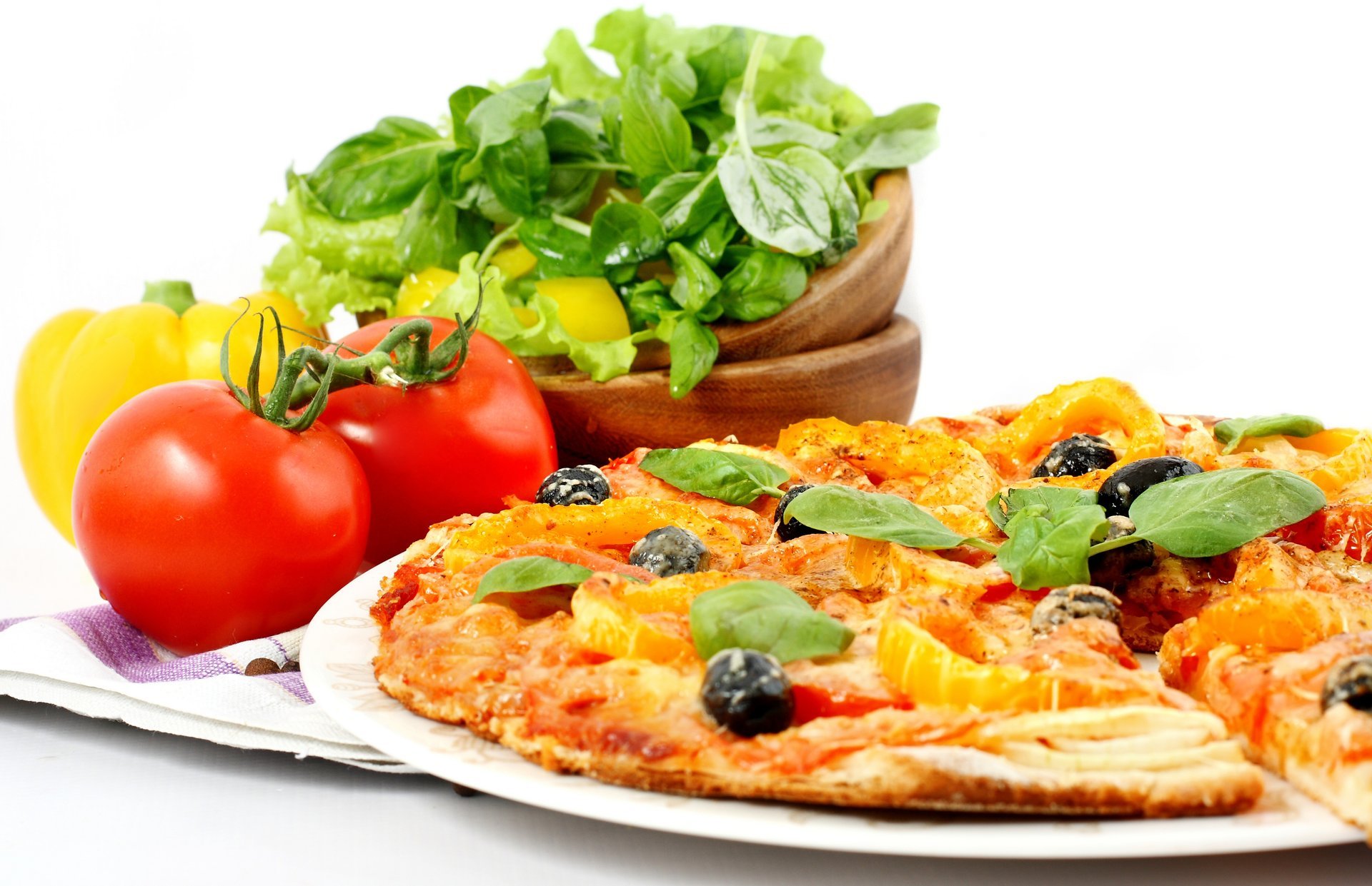 pizza italian cuisine tomato onion greens salad bell pepper olive meat cheese dish towel torment green pepper olives