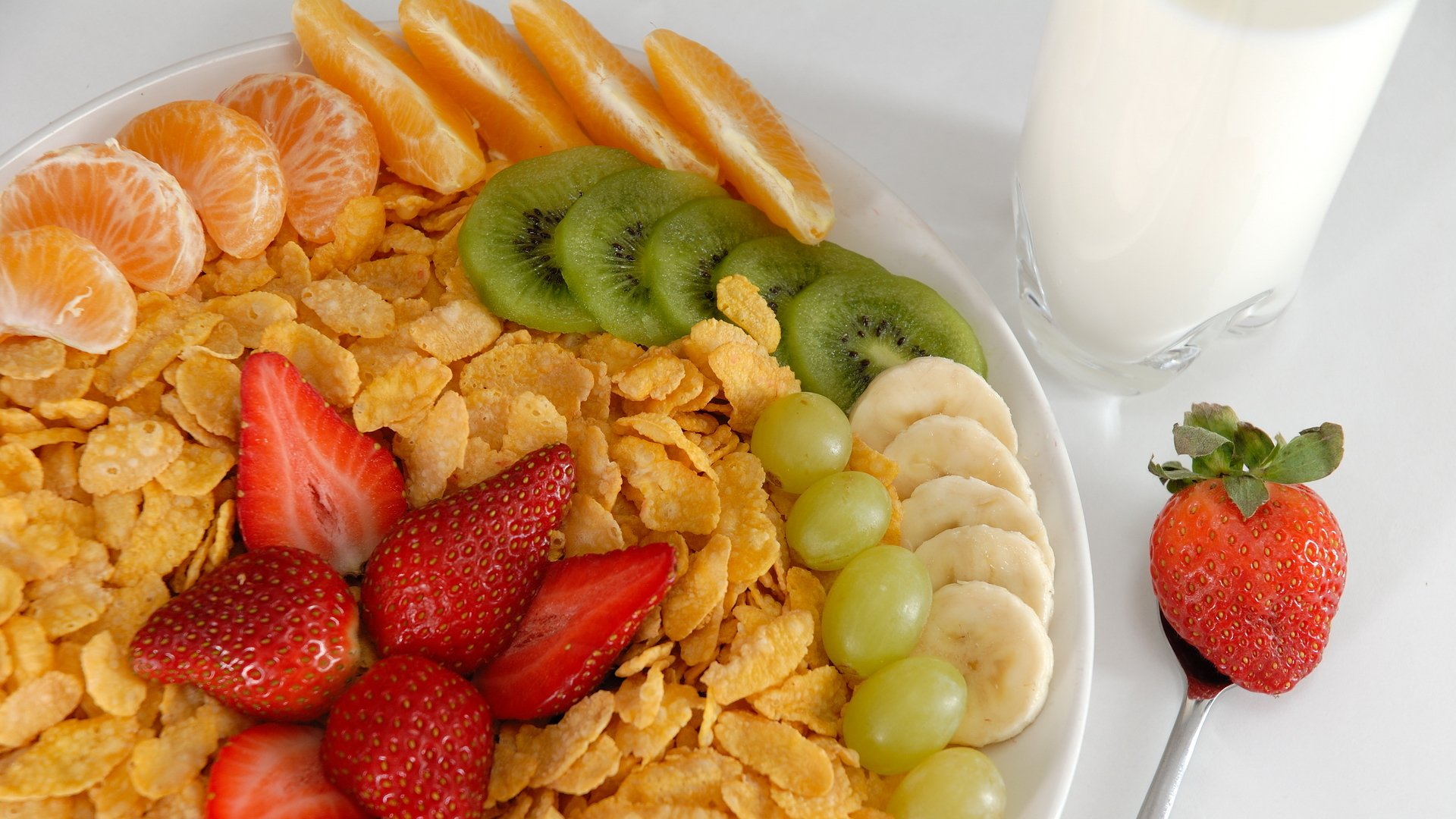 food sweet dessert corn flakes strawberry banana orange kiwi grapes mandarin milk glass fork corn-flakes grape cup 1920x1080