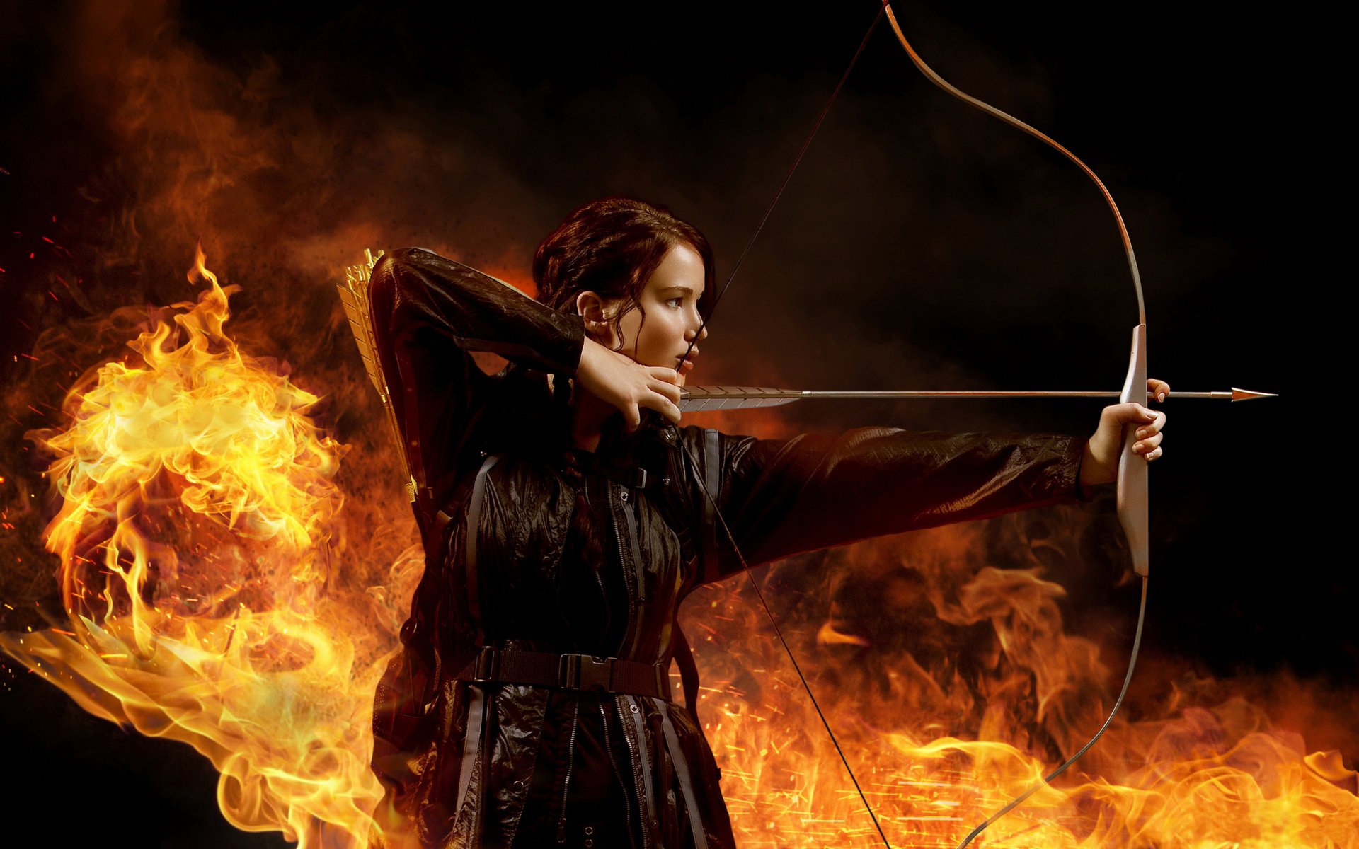hunger games brunette jennifer lawrence in the hunger games concentration shot training fight to survive opinion manicure equipment clothing quiver onions string boom fire sparks dark background film