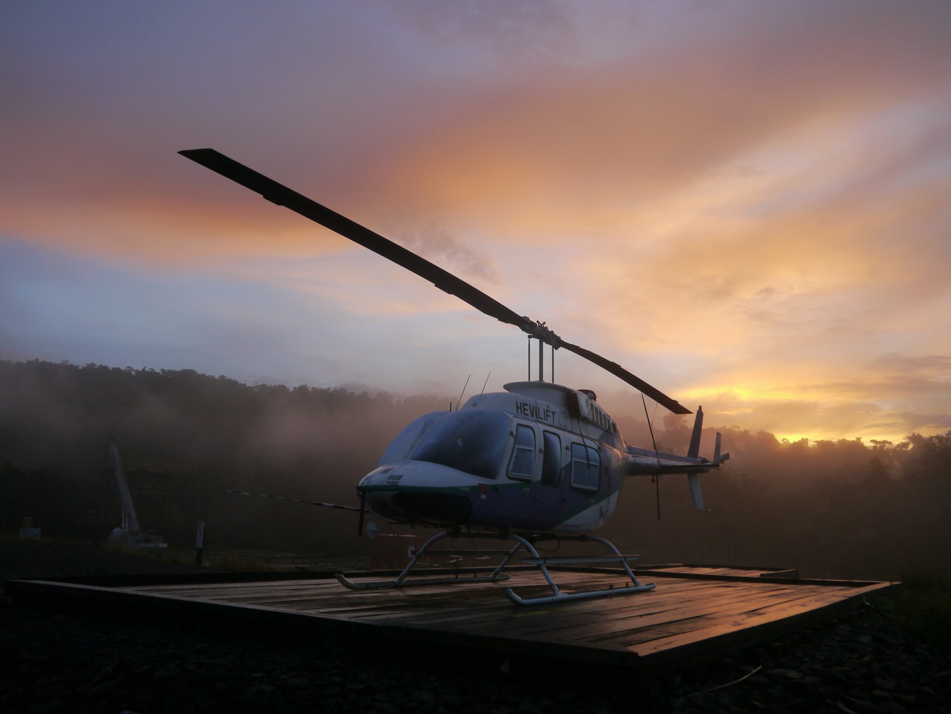helicopter chopper bell longranger sunrise jungle morning scene png