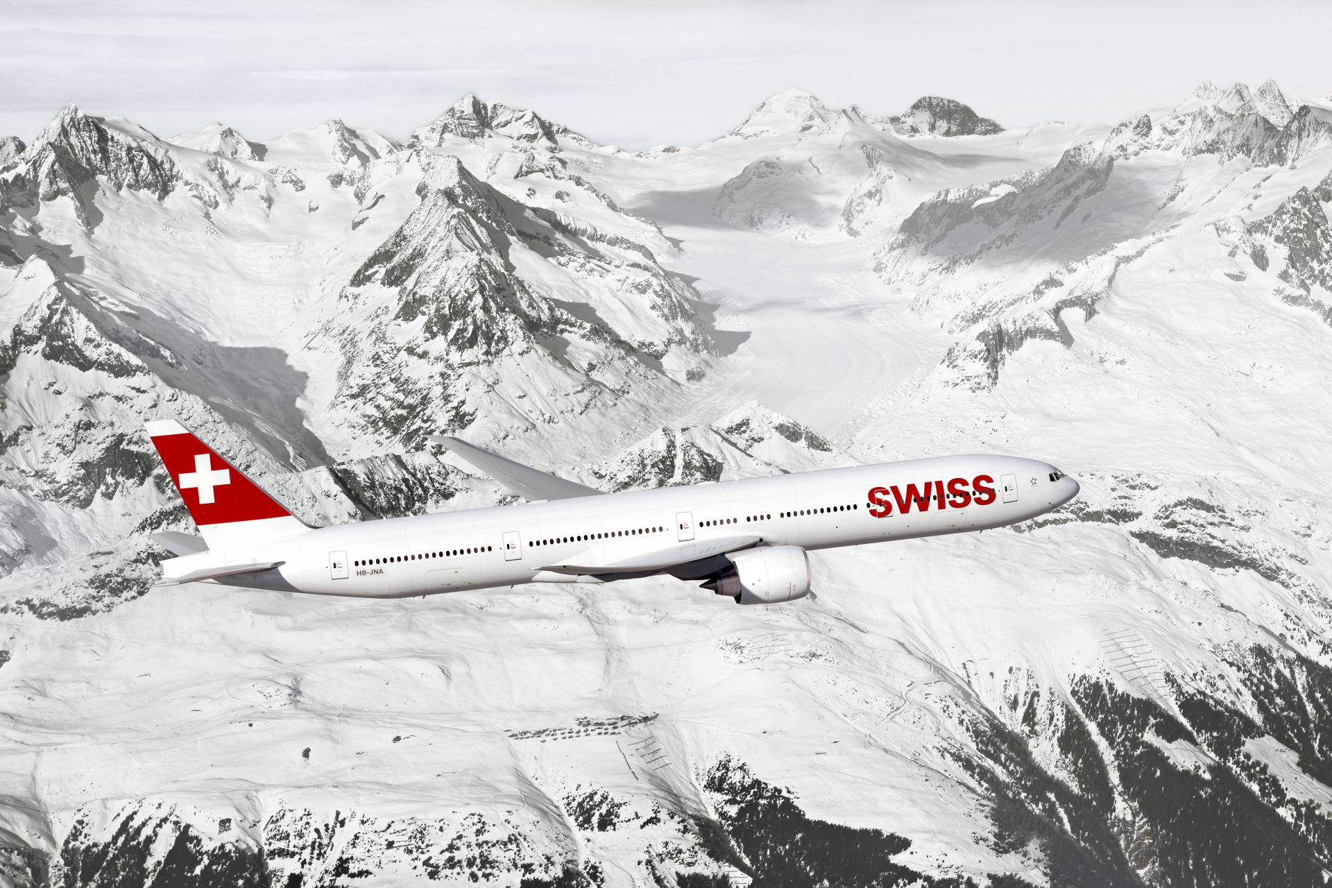 swiss plane passenger airliner boeing er height wing engine sky mountain rock snow aircraft passenger airliner flight mountains rocks