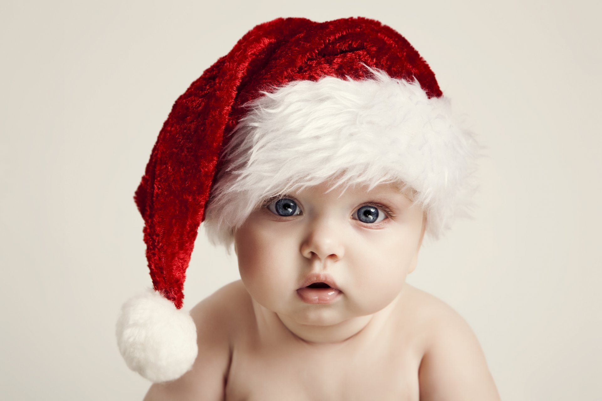happy baby kid big beautiful blue eyes children new year merry christmas adorable funny enjoy christmas hat happy babe to enjoy the christmas