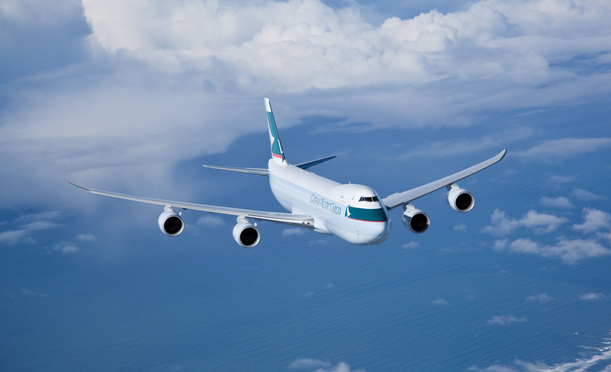 boeing 747 cathay pacific trucks flight flies in the air sky clouds sea aviation