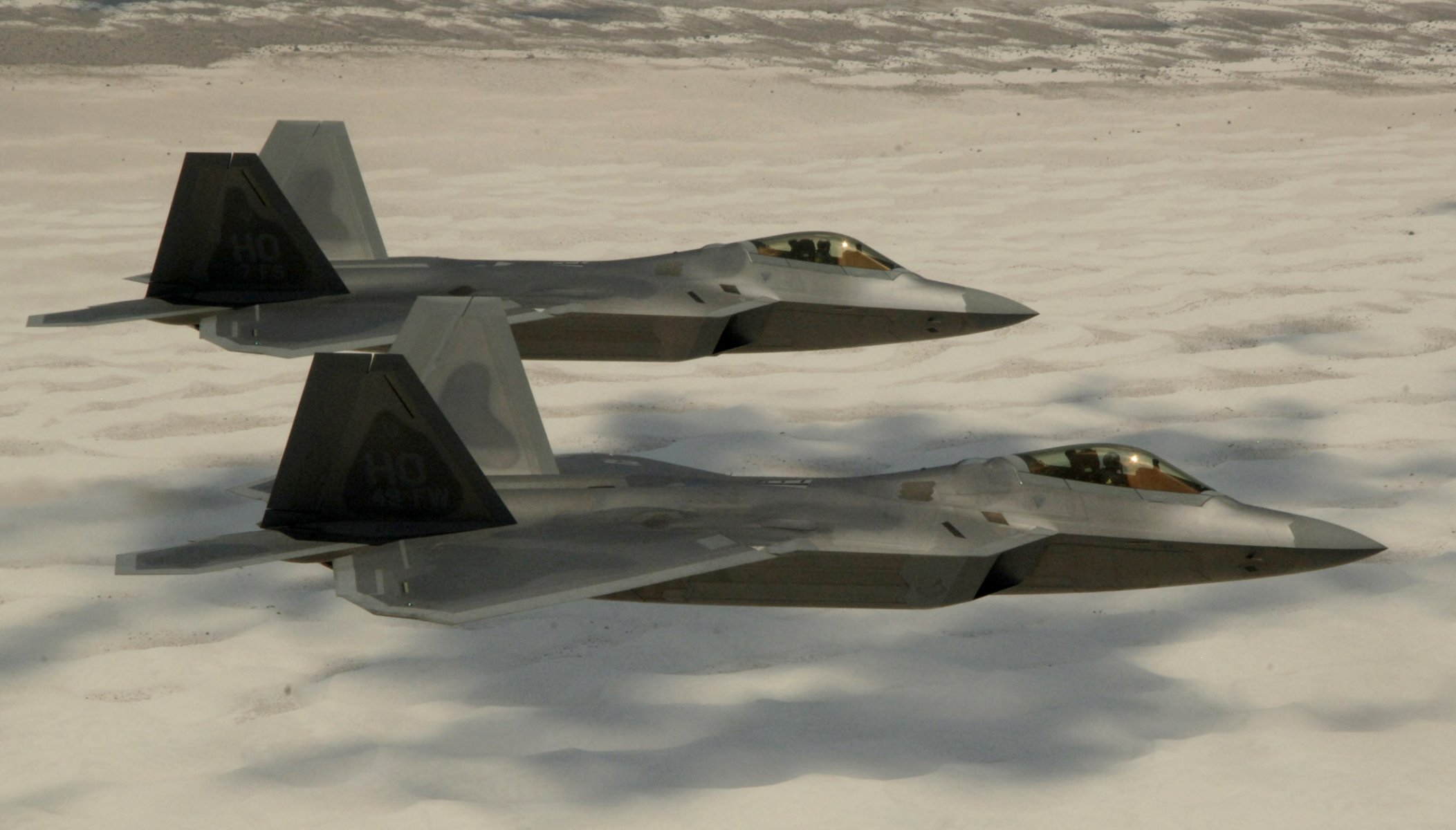 photo lockheed/boeing f-22 raptor multi-purpose fighter flight height desert sand