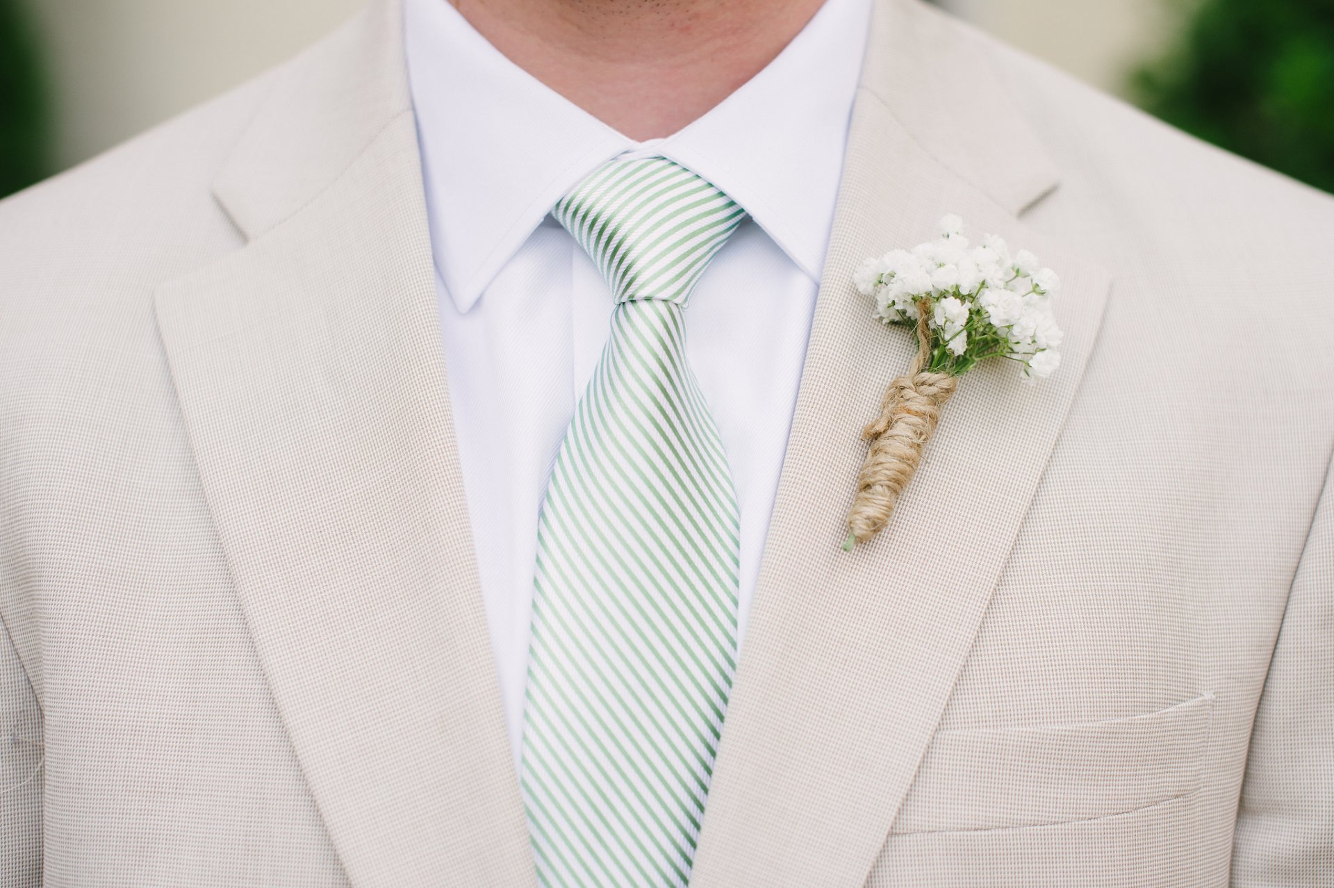 suit necktie groom flower