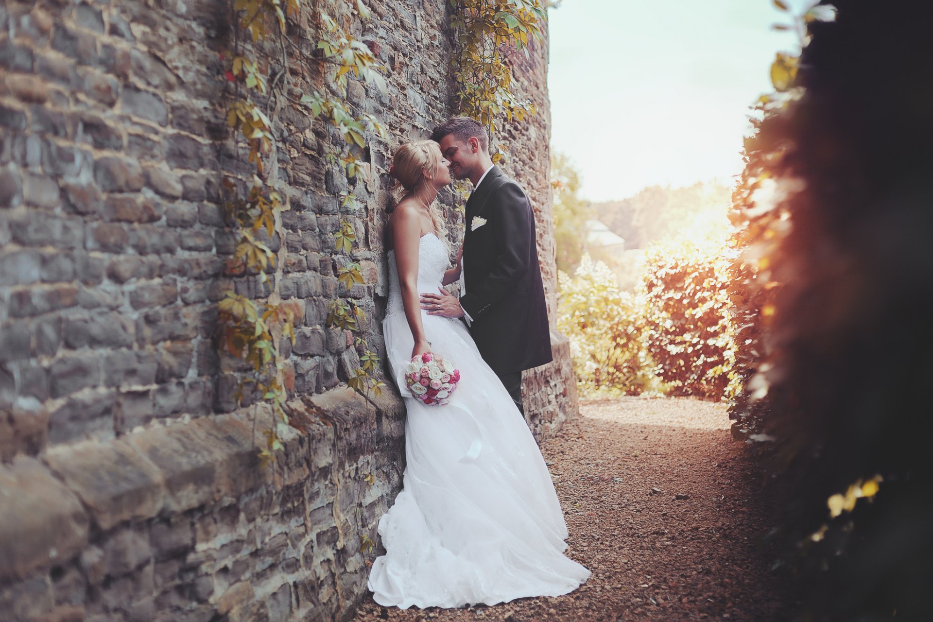 groom bride love kiss dress suit