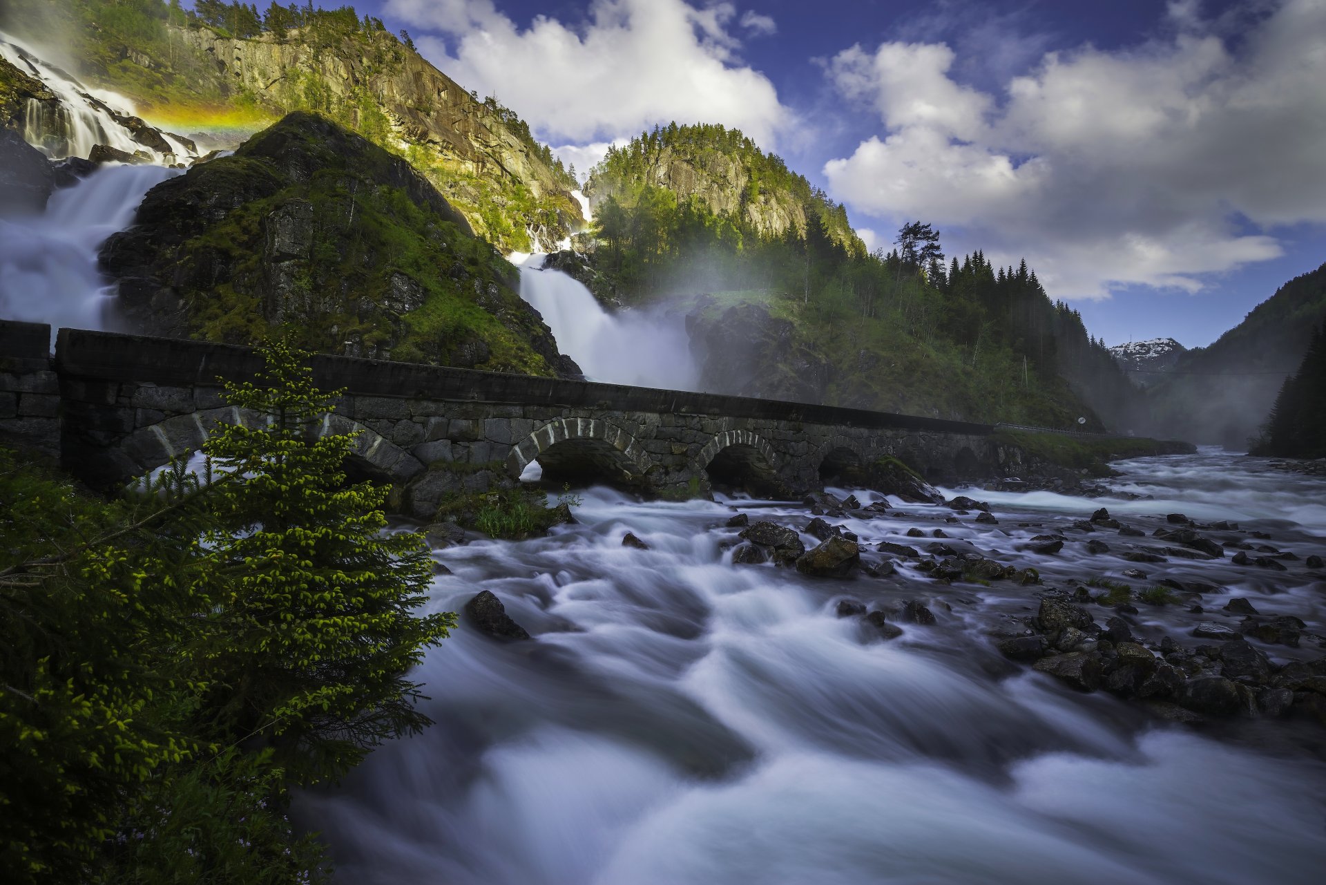 latefossen odda norway låtefossen odd waterfall stage river bridge rock mountain stones