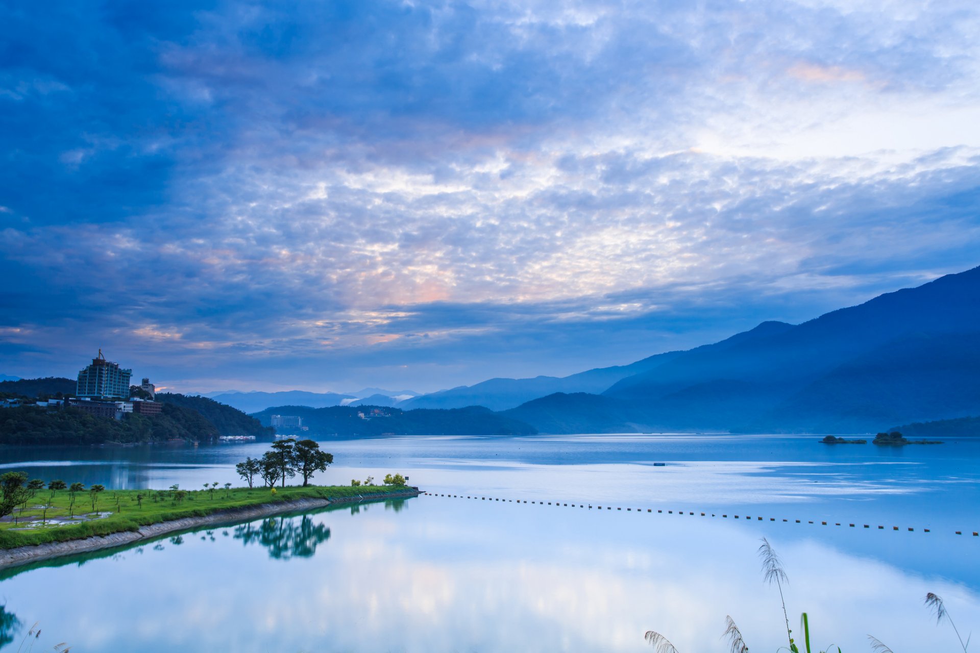china taiwan nantou morning dawn mountain blue sky clouds lake reflection beach tree nature