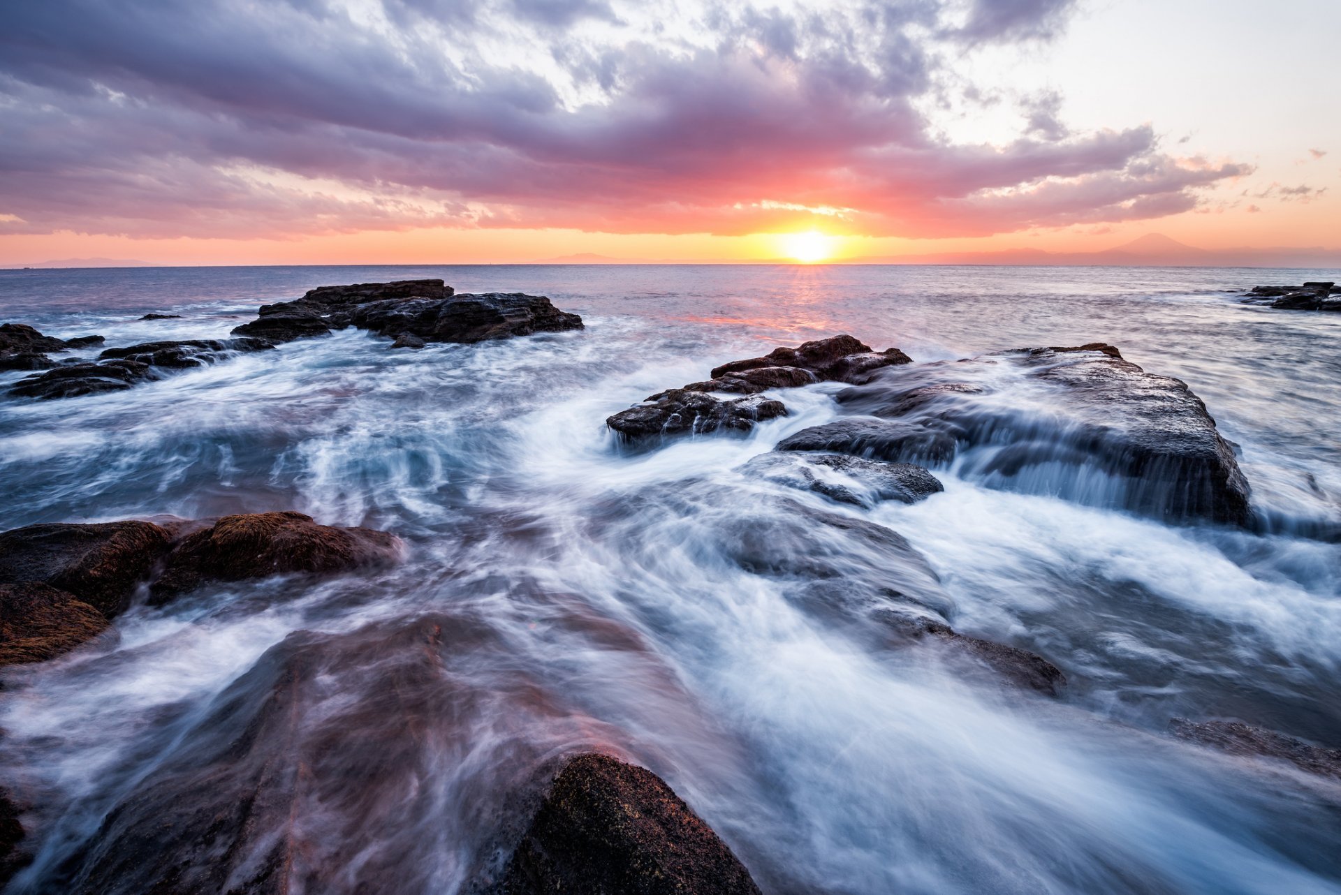 japan kanagawa prefecture sea beach waves stones night sun sunset horizon sky clouds