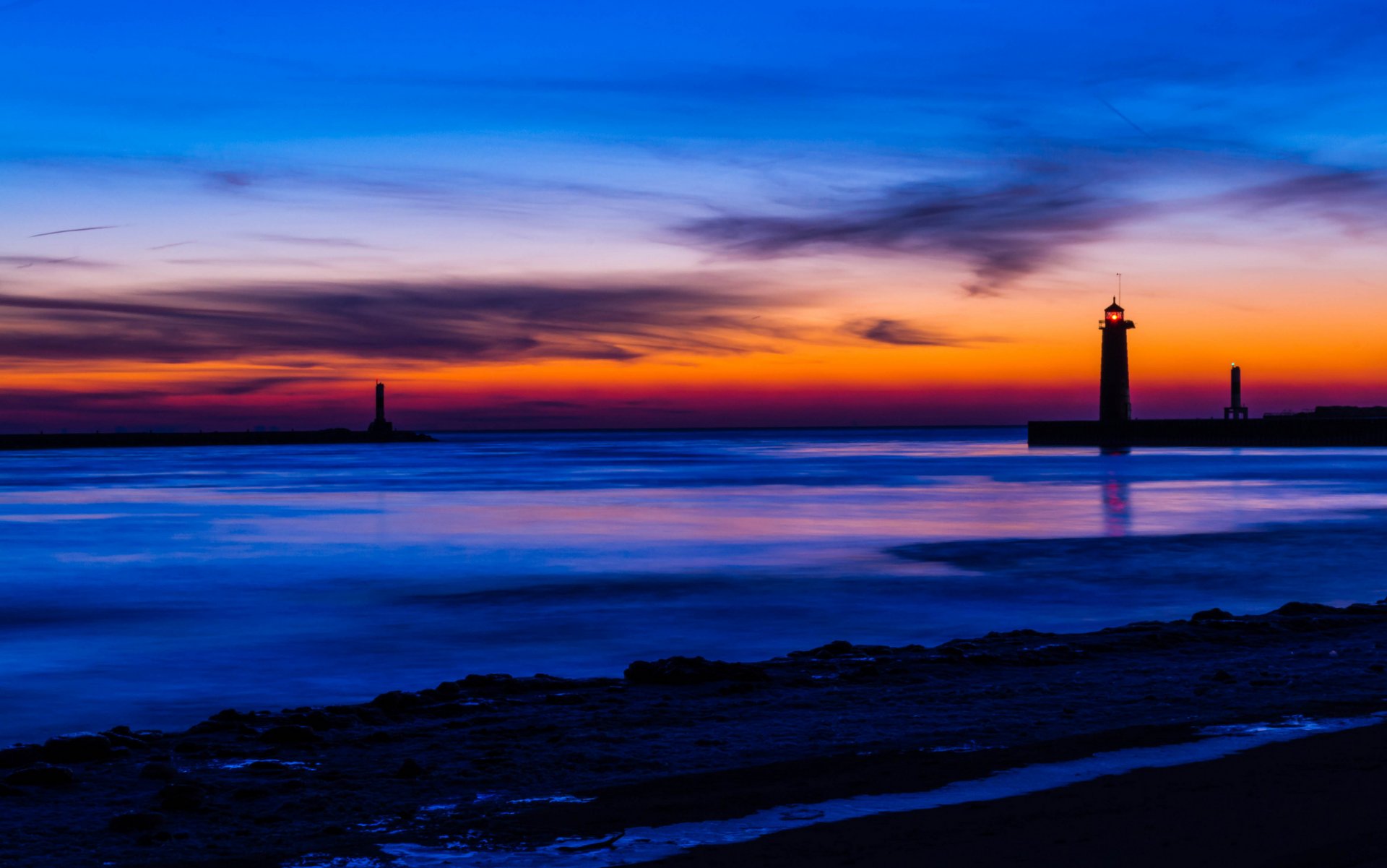 united states michigan lake beach lighthouse night orange sunset blue sky clouds
