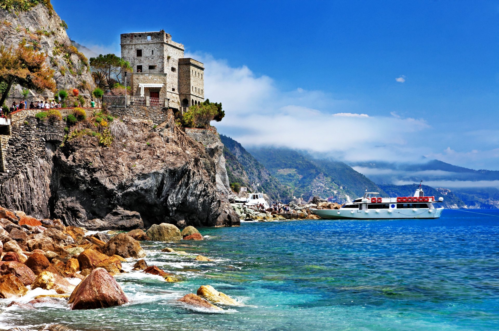 monterosso al mare cinque terre italy town rock fortress boat sea coast stones landscape sky nature tree green