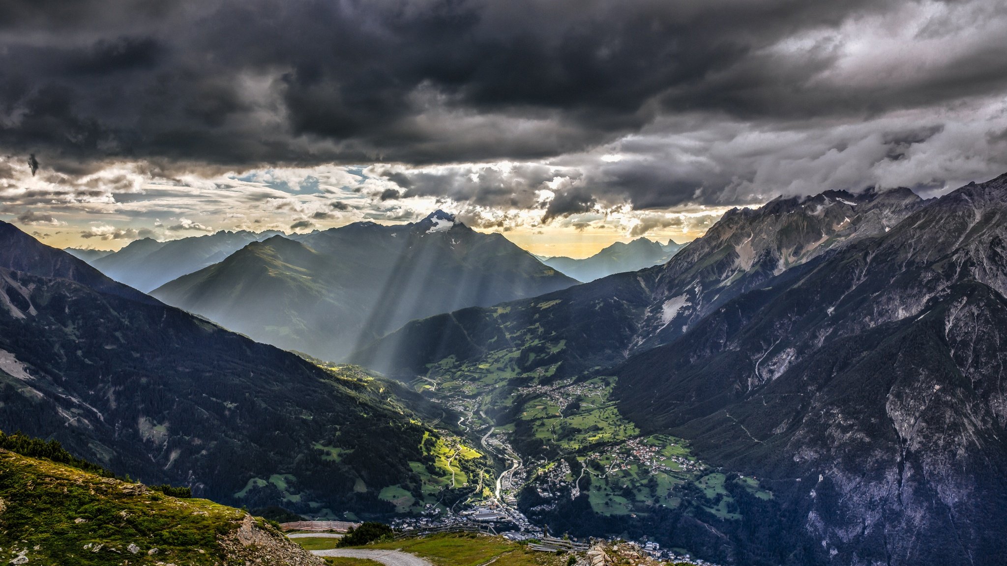 torsten muehlbache alps blue dark europe green landscape mountain nature red sun sunset thunderstorm clouds rays road town sky hd
