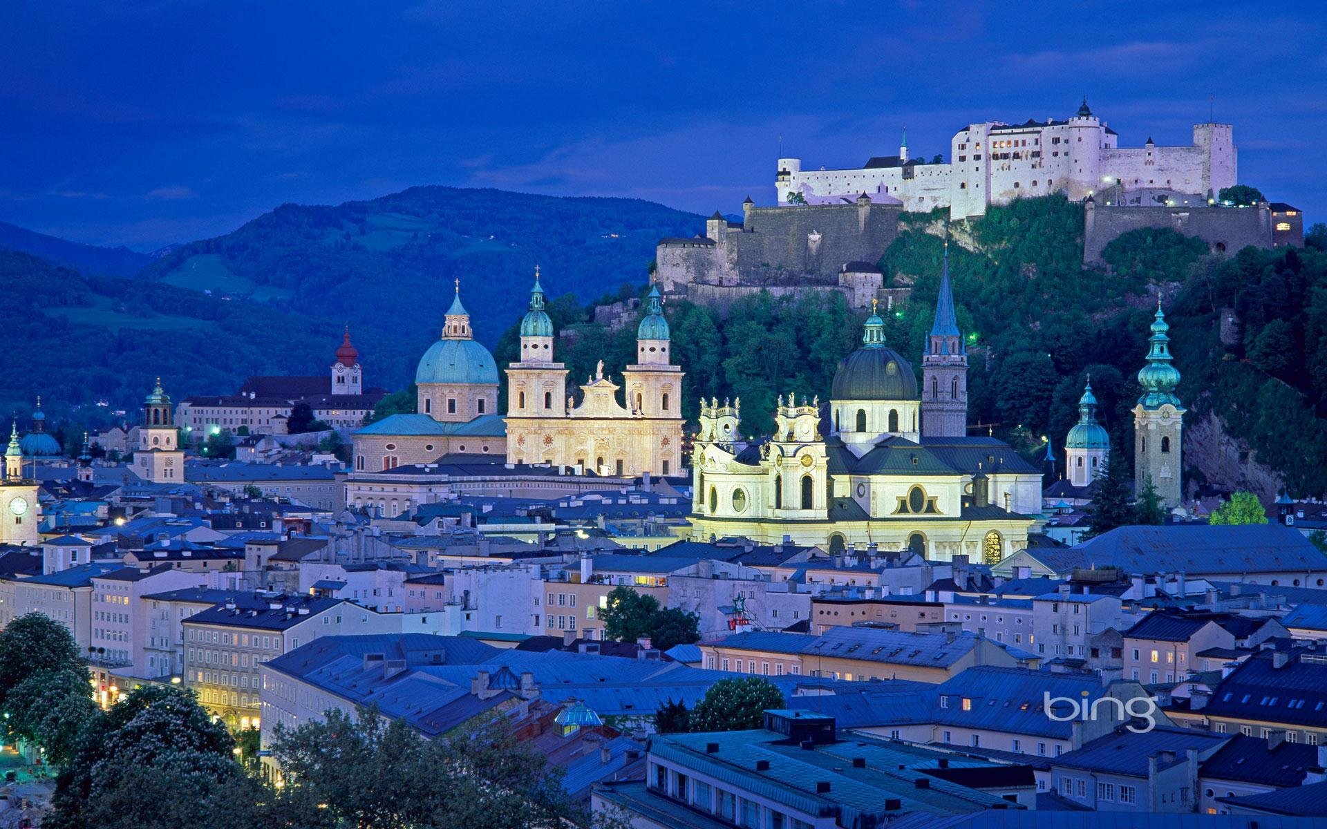 salzburg austria town mountain castle night lights architecture sky cathedral house roof tower dome