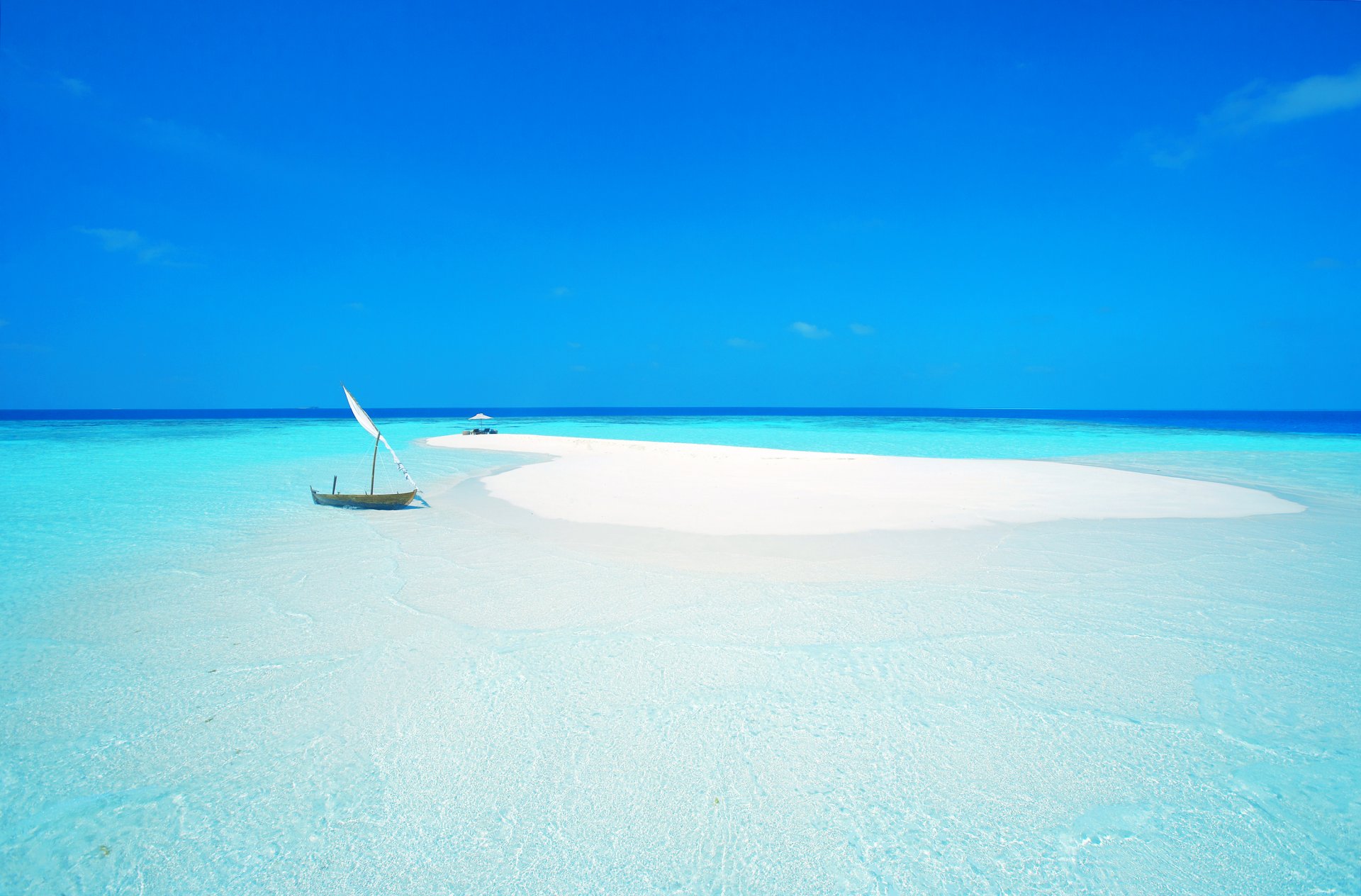 sky sea ocean the maldives island sand beach boat sail umbrella chair