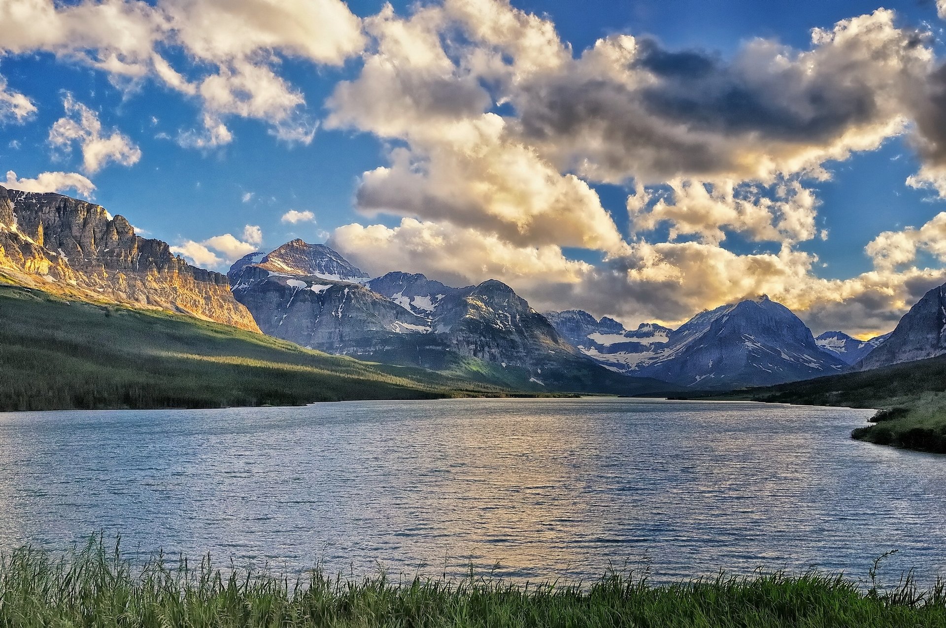 lake sherburne glacier national park montana lake mountain clouds